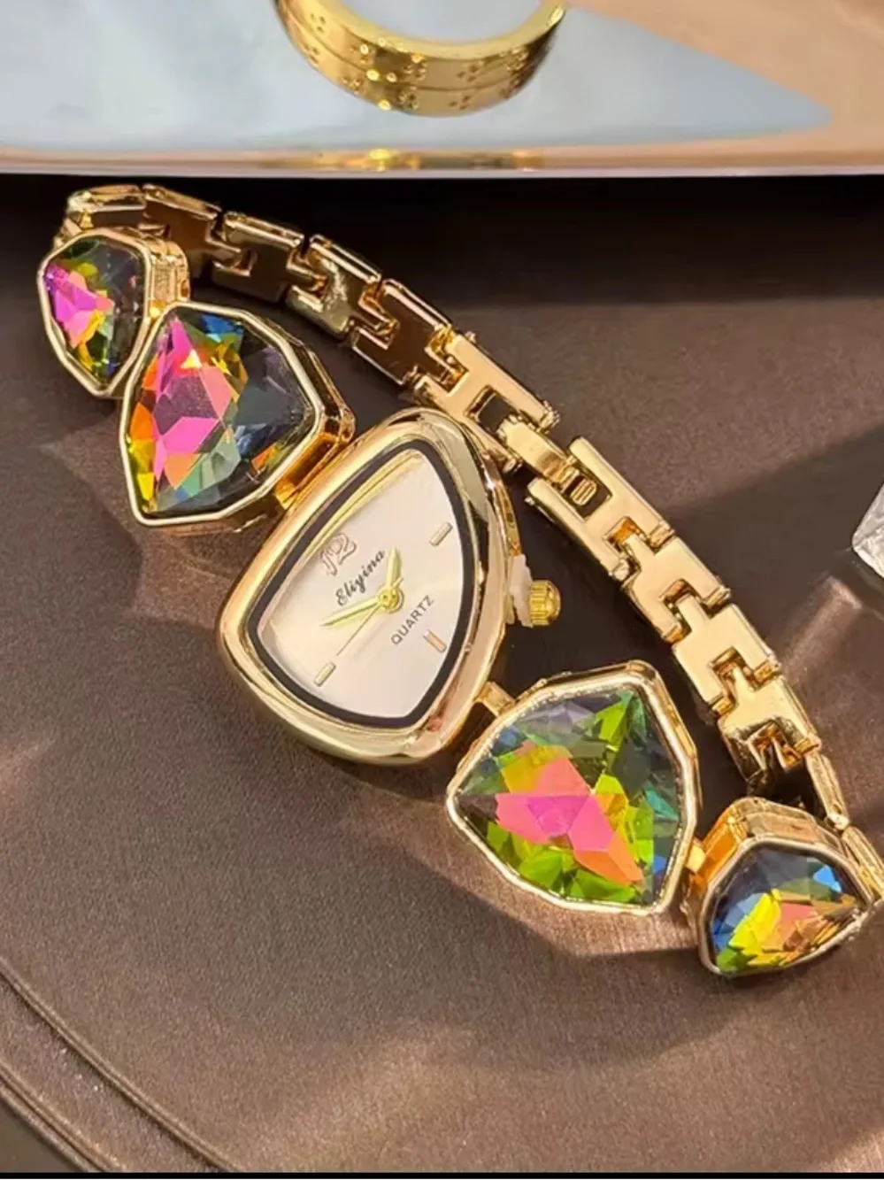 Anthropologie Gold Watch with Iridescent Green-Pink Gemstones